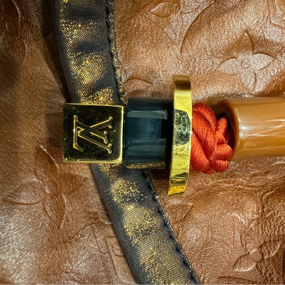 Louis Vuitton Snakeskin-Trimmed Monogram Epices Kalahari GM - Picture 11 of 14